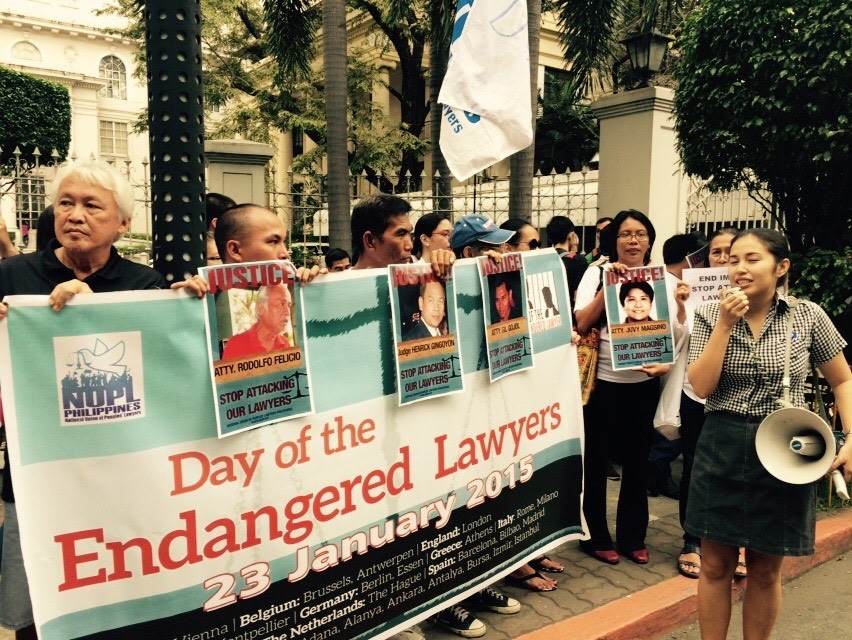 Members of the National Union of Peoples' Lawyers and their clients troop in front of the Supreme Court to call against attacks on lawyers.