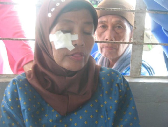 Samrah Sampaulna, wounded during PNP-SAF's indiscriminate firing. Her daughter Sarah was killed.