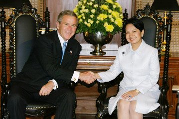 Criminals Gloria Arroyo and George W. Bush